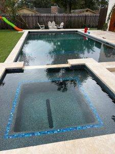 spillover spa installed in pool