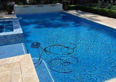 water feature plaster pool tile deck